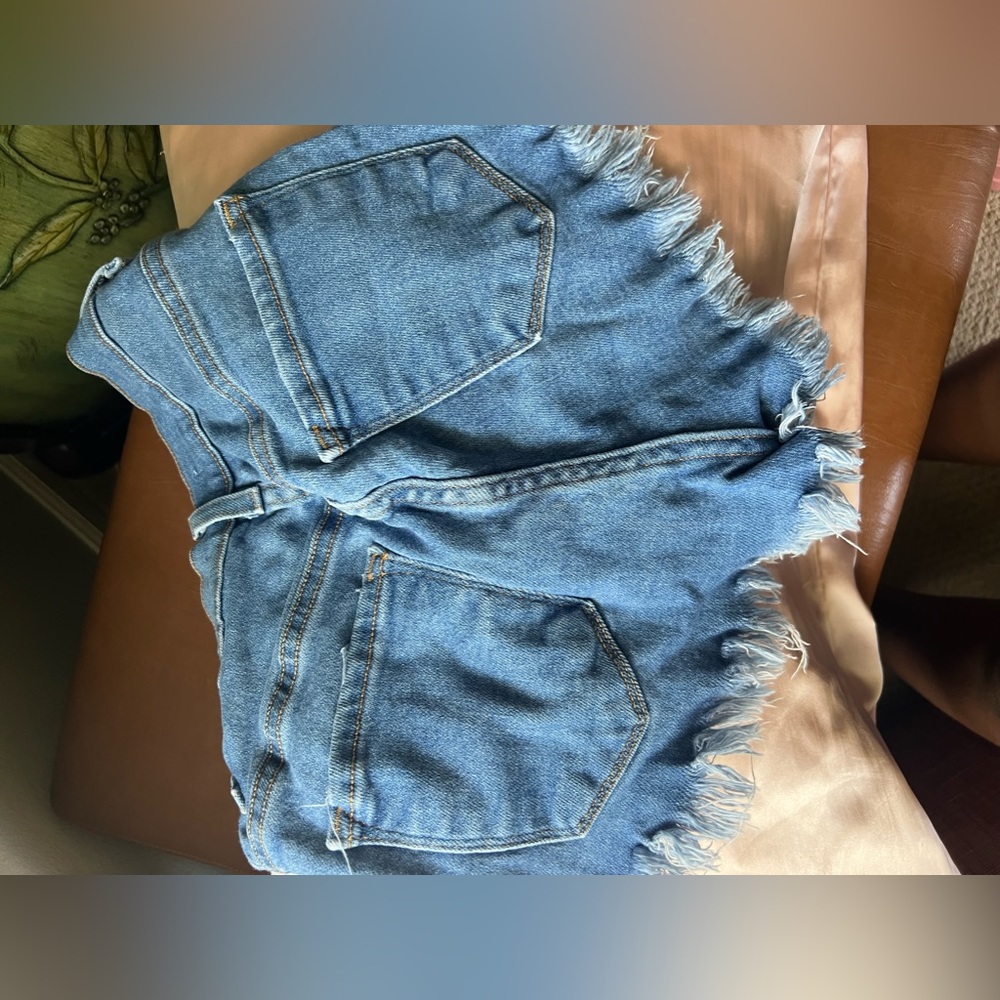 Fringed shorts.